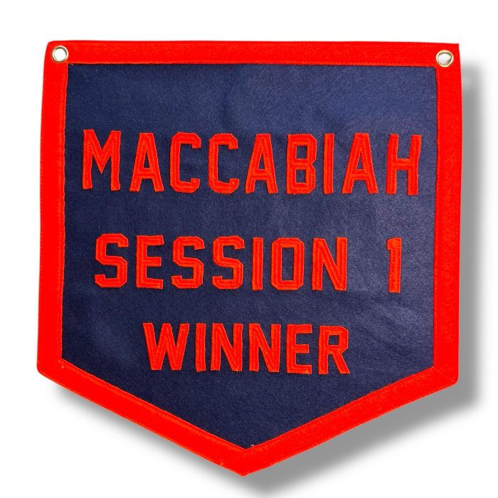 Navy felt banner with red trim reading Maccabiah Session 1 Winner