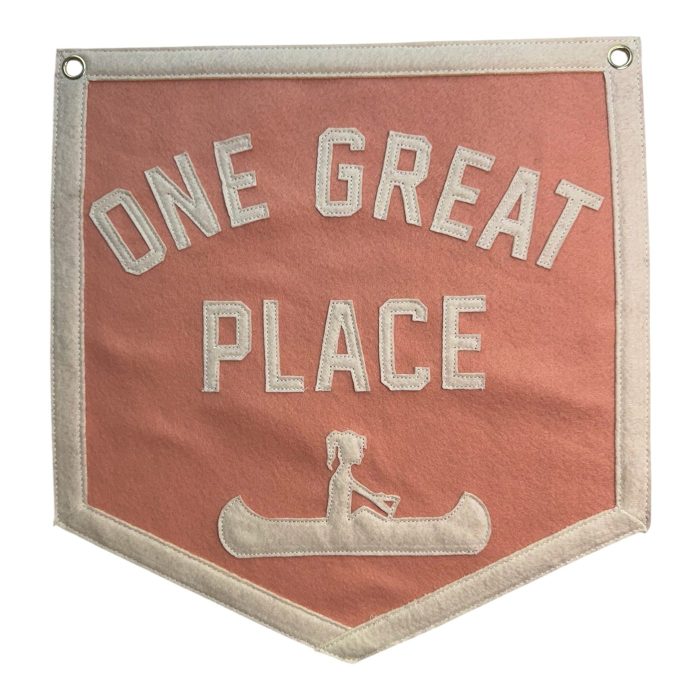 Coral felt banner reading One Great Place with a cream canoe