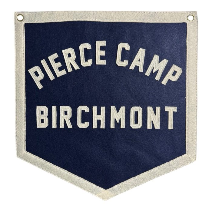 Navy felt banner reading Pierce Camp Birchmont in cream lettering