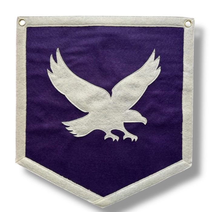 Purple felt Color War banner with a cream felt eagle design